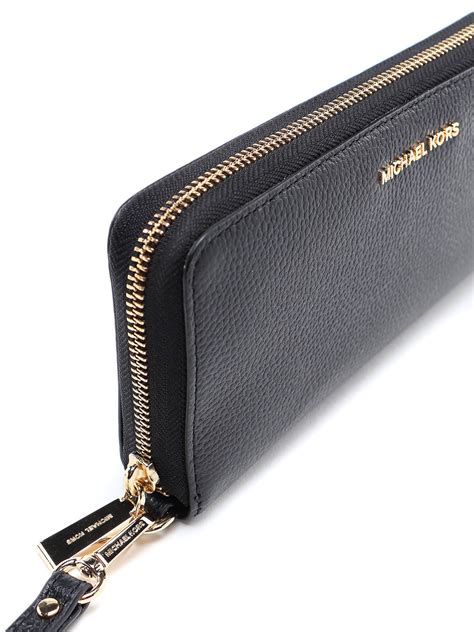 michael kors black jet set continental wallet|Michael Kors travel continental wallet.